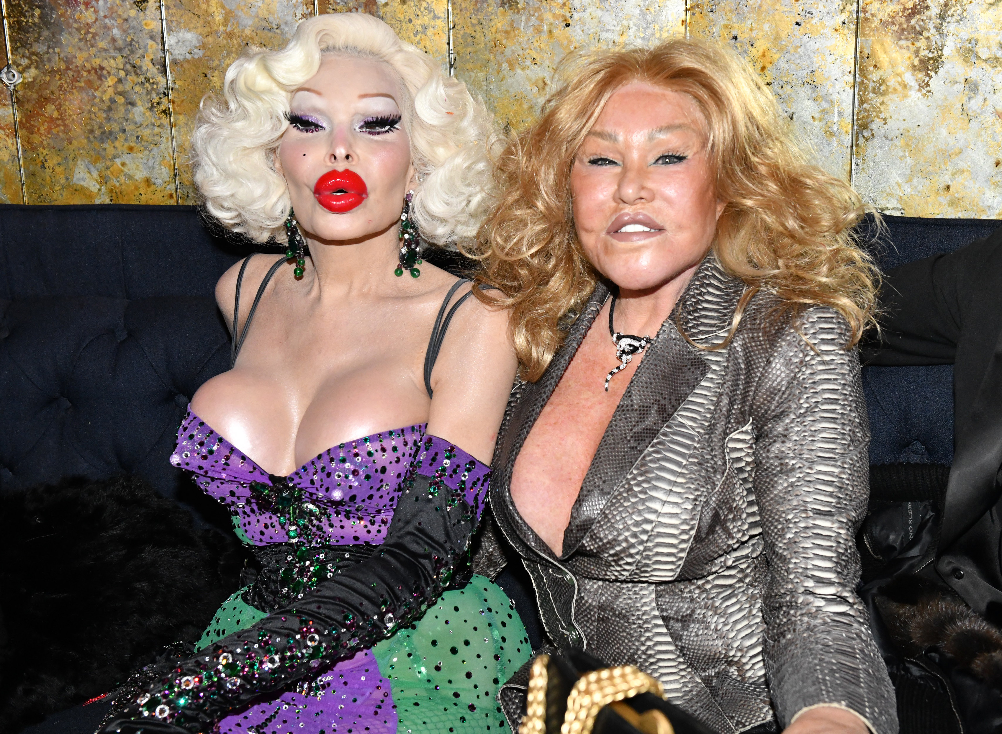 Jocelyne Wildenstein was captured with an upturned expression, giving her entire mid-face an unusually wide appearance, while attending the Honey Birdette Halloween celebration with Amanda Lepore at Bartschland on October 28, 2021, in New York City.