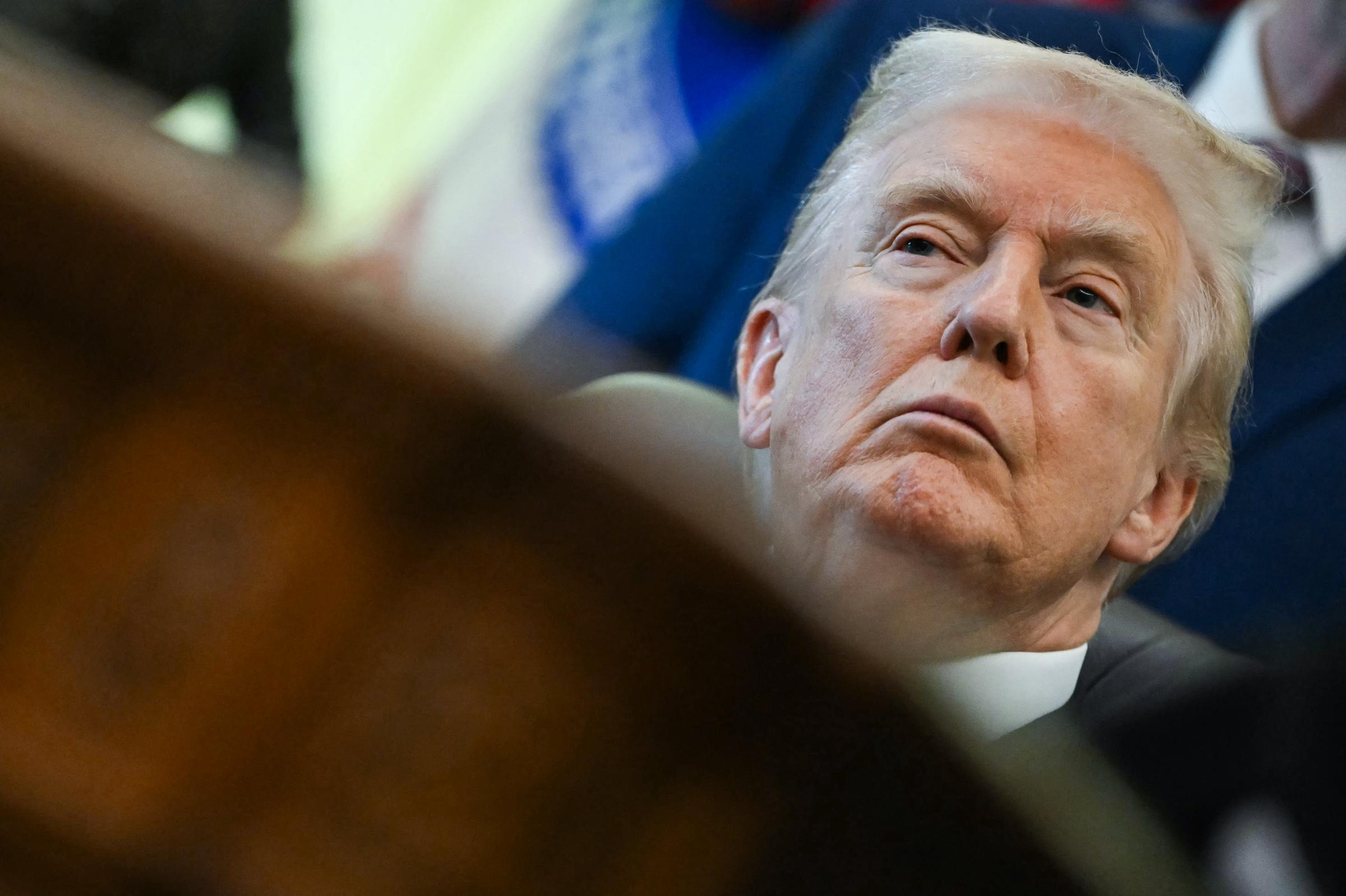 President Donald Trump listens during the event. | Source: Getty Images