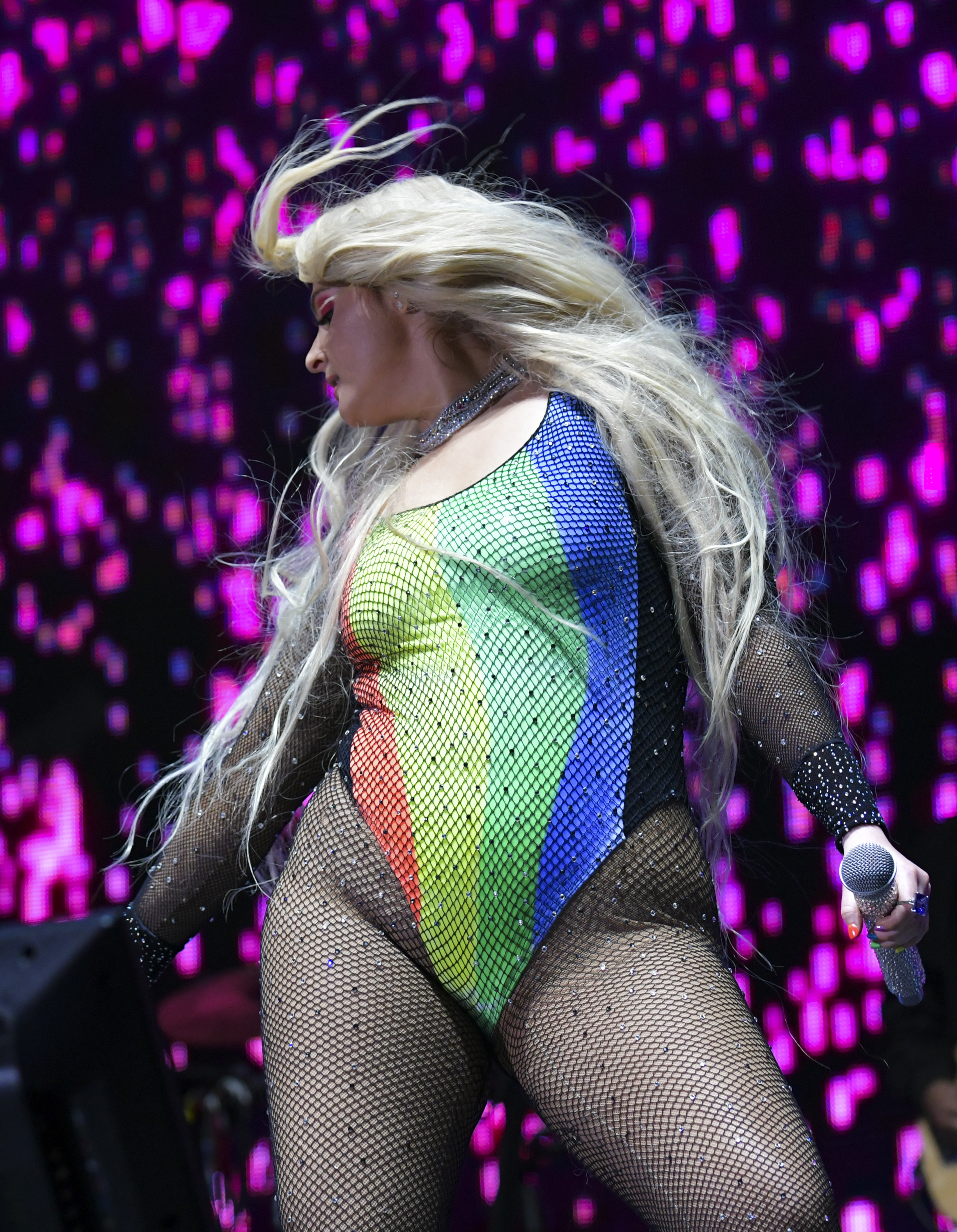 Meghan Trainor, 25, performed onstage at LA Pride on June 8, 2019, in West Hollywood, California. Her body shape was curvaceous, featuring a full bust, defined waist, and prominent hips and thighs emphasized by her mesh bodysuit.