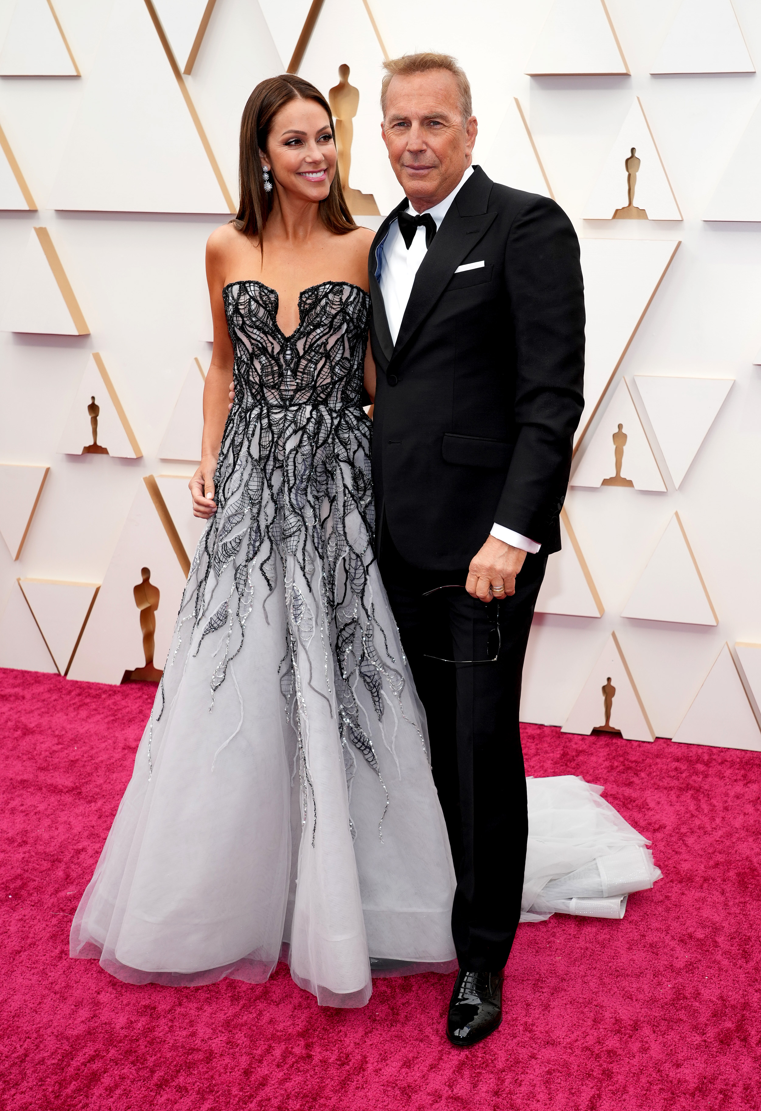 Christine Baumgartner and Kevin Costner at Hollywood and Highland on March 27, 2022 | Source: Getty Images