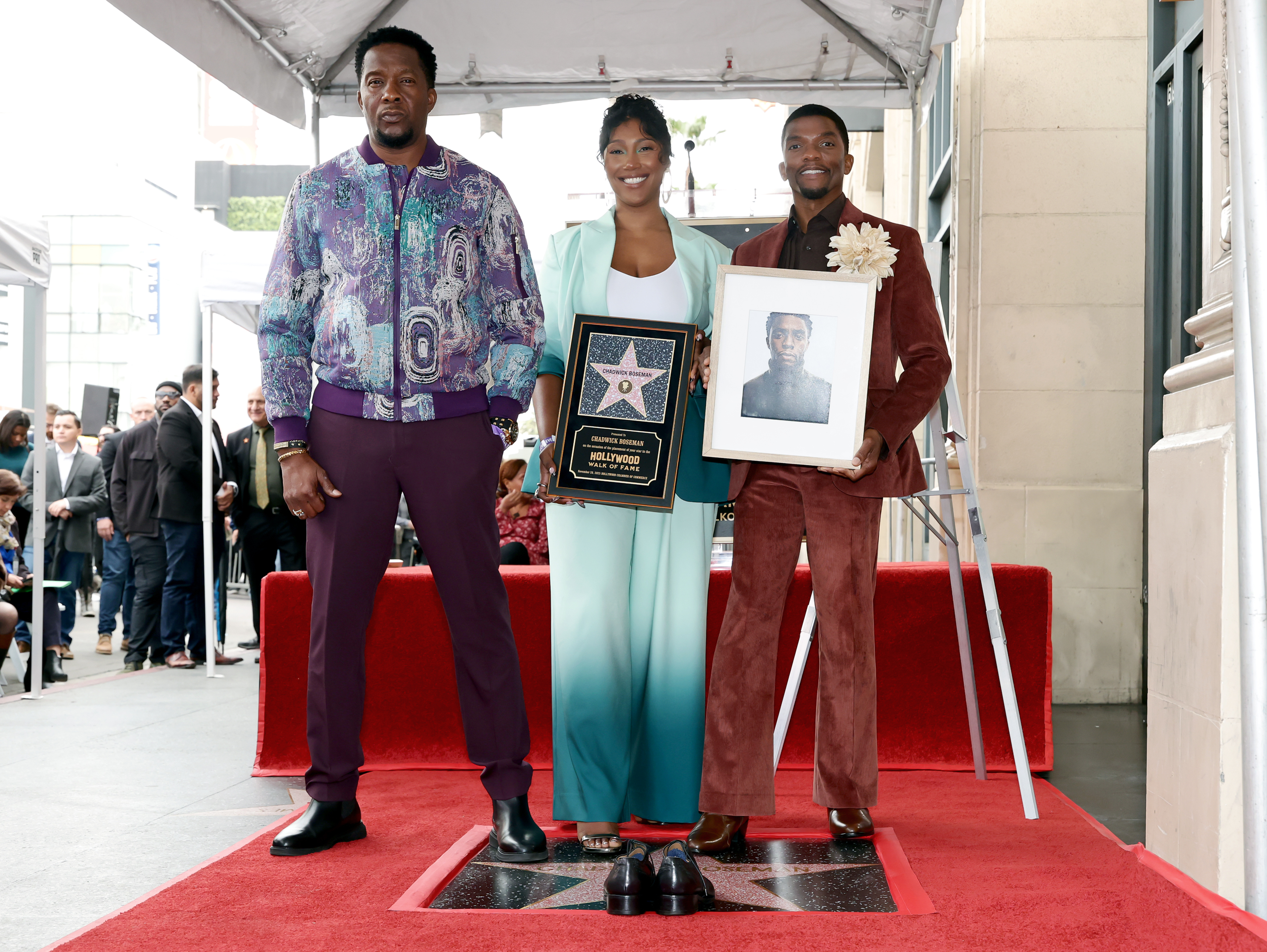 Derrick, Taylor Simone Ledward, and Kevin Boseman pictured on November 20, 2025, in Hollywood, California | Source: Getty Images