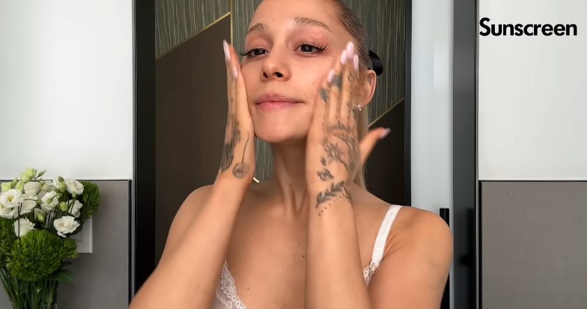 Ariana Grande doing her skincare routine from a post dated September 12, 2023. | Source: YouTube\Vogue