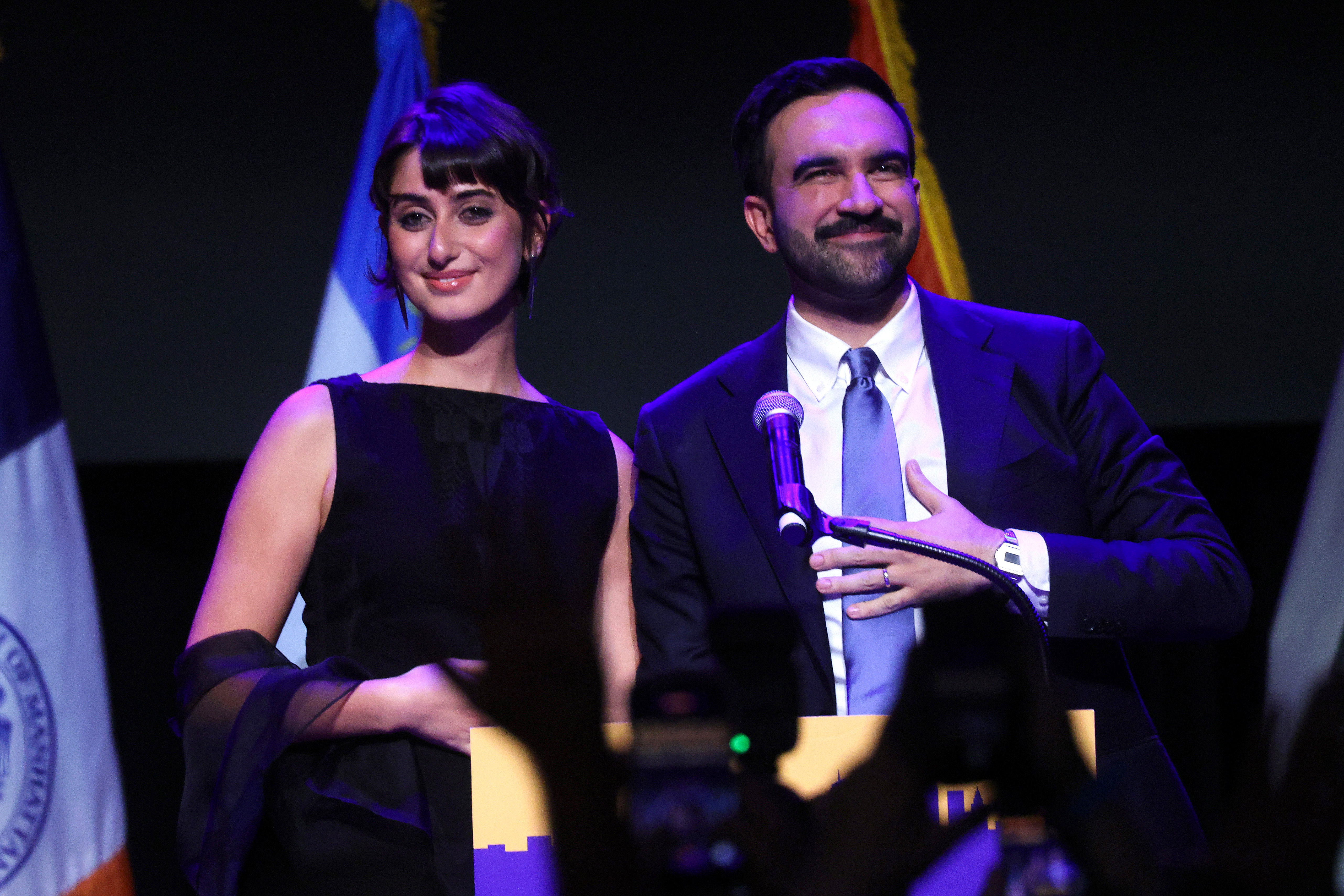 Zohran Mamdani stands with his wife Rama Duwaji after delivering remarks at his election night watch party at the Brooklyn Paramount on November 4, 2025, in the Brooklyn borough of New York City | Source: Getty Images