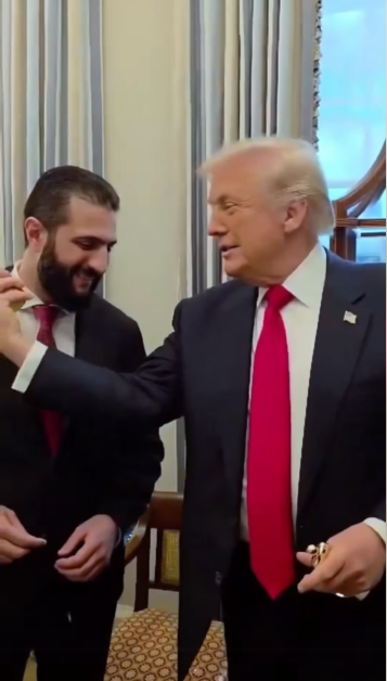 US President Donald Trump spritzes Syrian President Ahmed al-Sharaa with cologne at the White House on November 10, 2025 | Source: Facebook/TheIndependentOnline