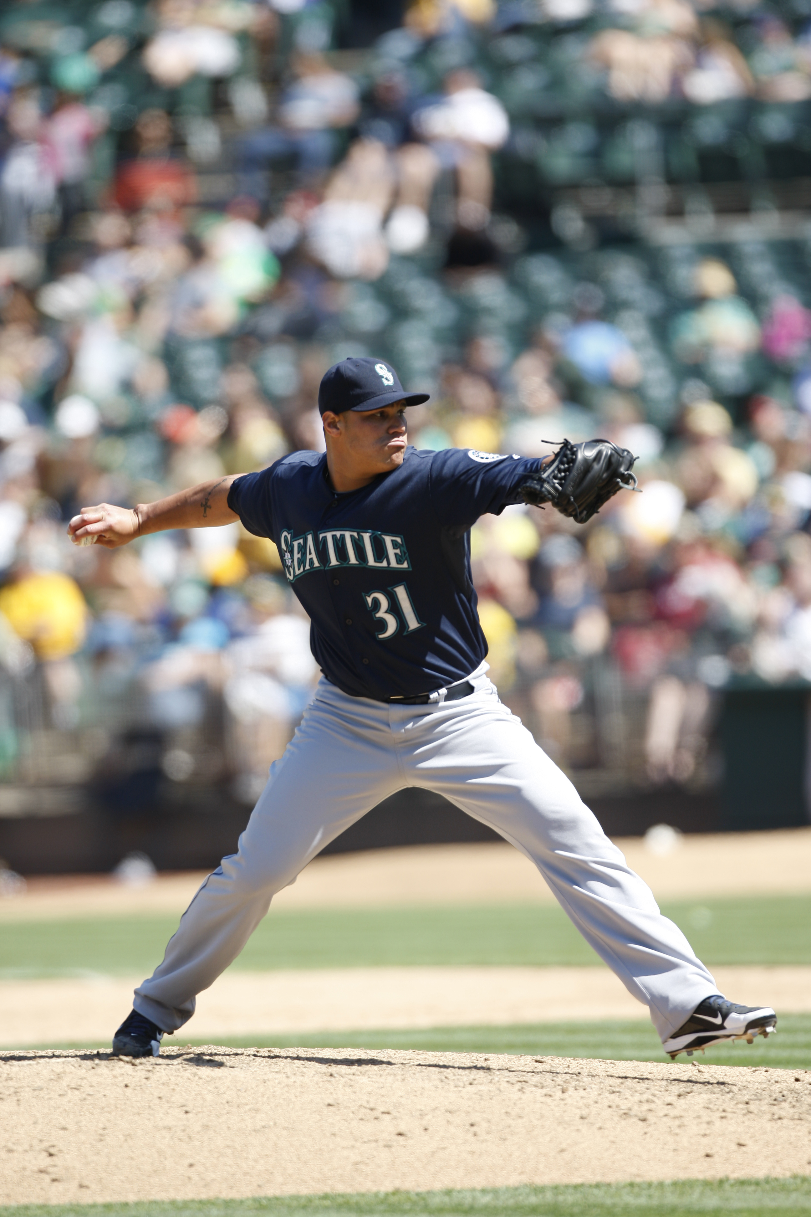 Yoervis Medina (#31) pitches for Seattle during a game in Oakland on August 21, 2013. | Source: Getty Images