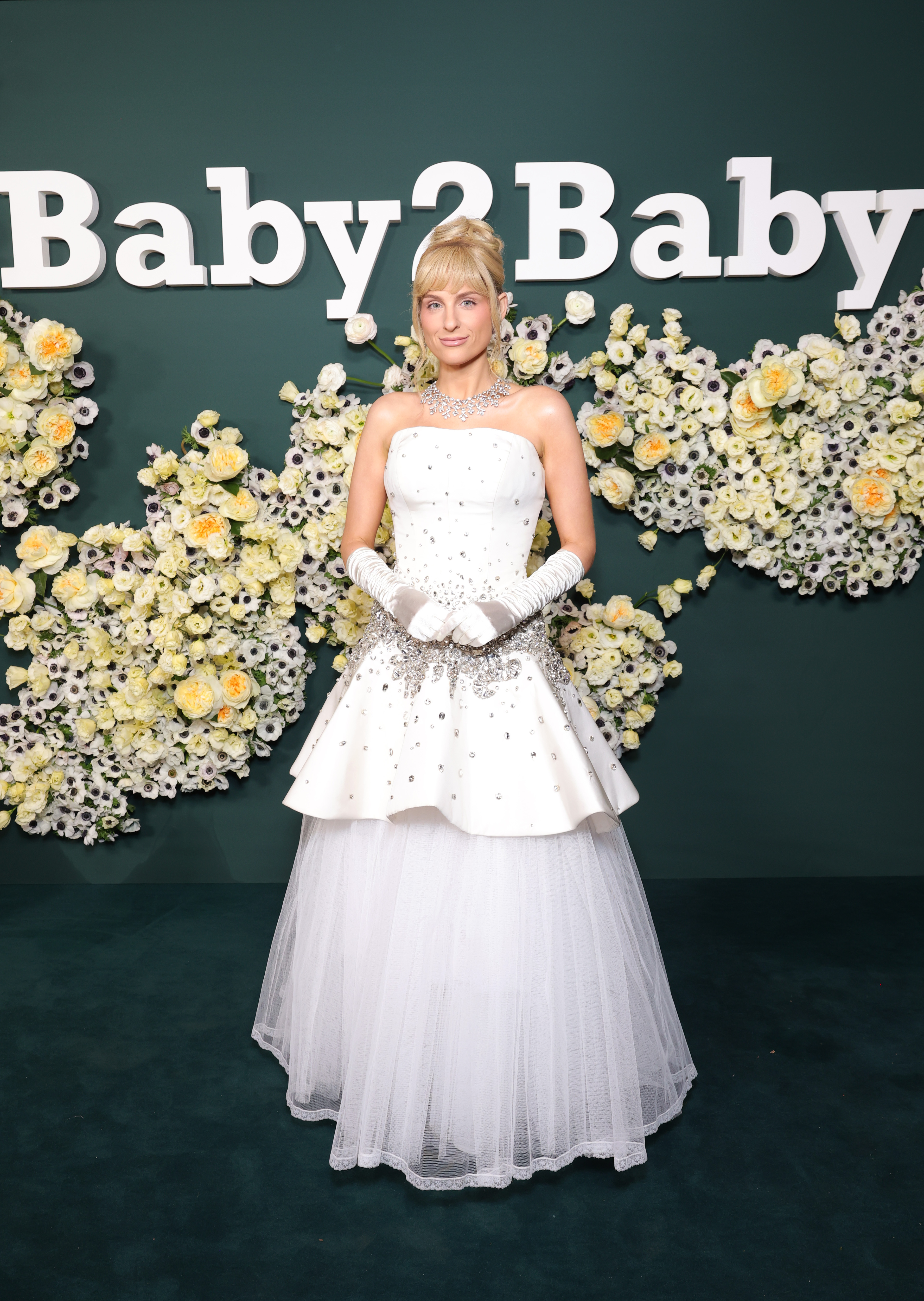 Meghan Trainor, 31, presented a visibly slender physique accentuated by the fitted bodice of her gown, with her shoulders and arms appearing toned and slim, while attending the Baby2Baby Gala presented by Paul Mitchell on November 8, 2025, at Pacific Design Center in West Hollywood, California.