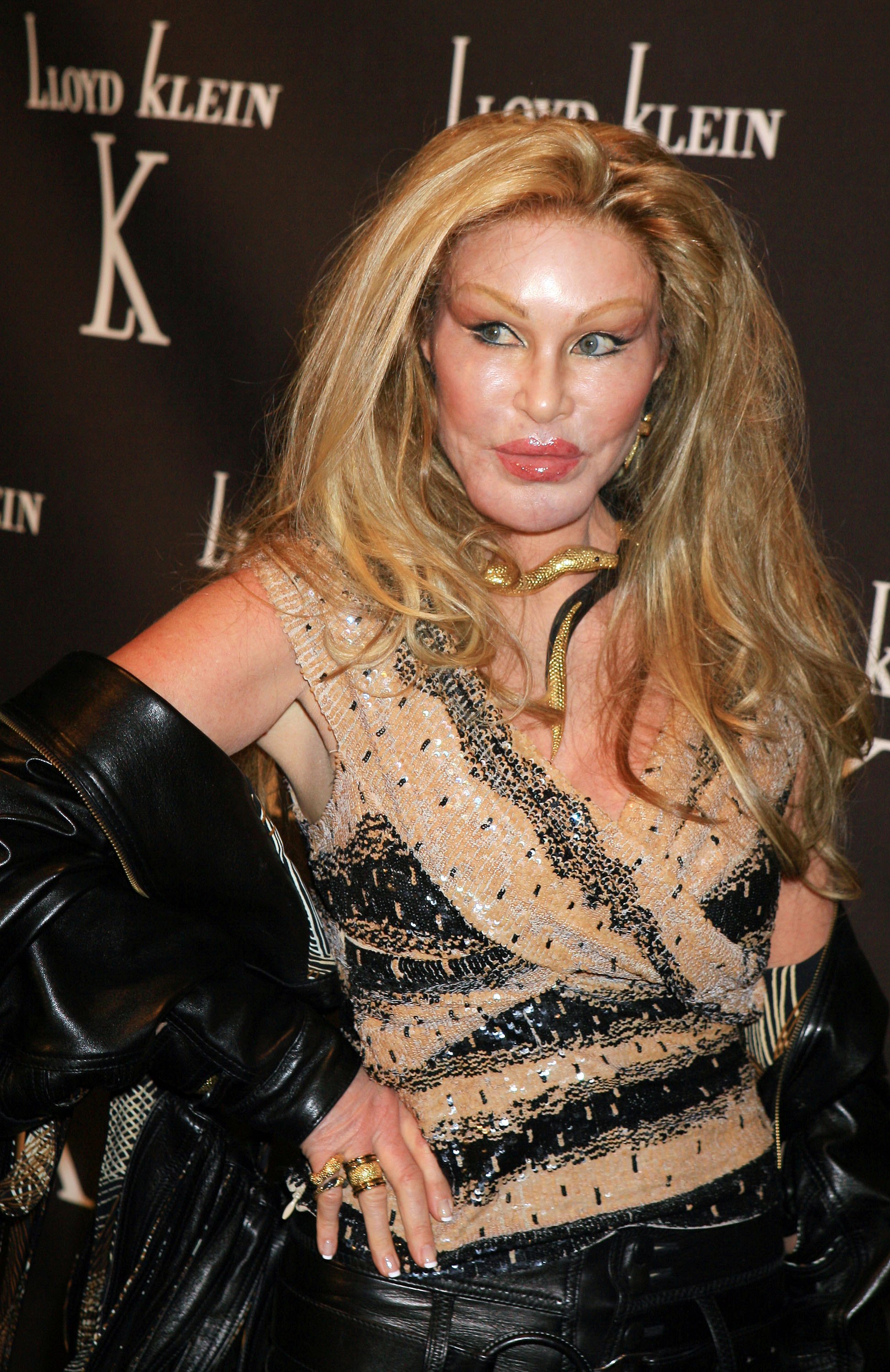 Jocelyne Wildenstein was captured with pale, very smooth facial skin and a broad nose, while arriving at the celebrity launch party for the opening of the Lloyd Klein flagship retail store on November 14, 2006, in Los Angeles, California.