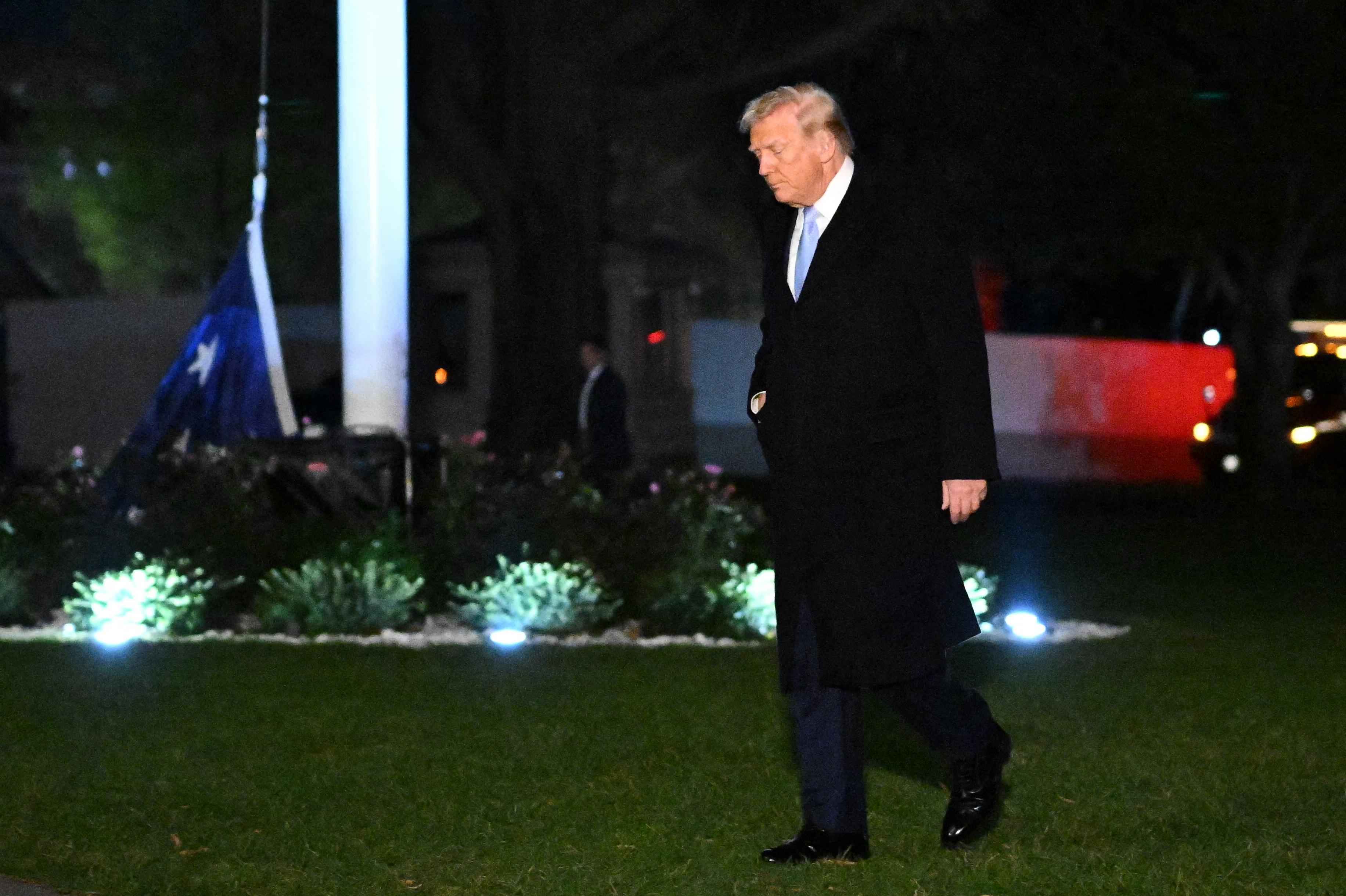 President Donald Trump walks on the South Lawn of the White House on November 16, 2025. | Source: Getty Images