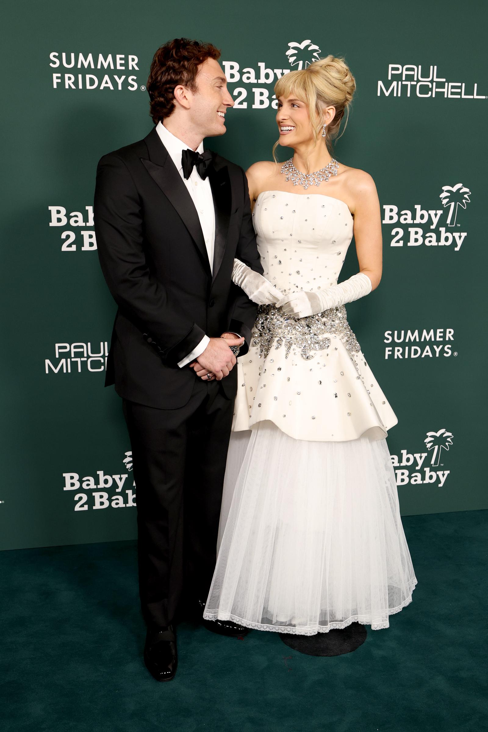 Meghan Trainor, 31, and her husband, Daryl Sabara, 33, attended the 2025 Baby2Baby Gala. The singer had a slender, well-defined facial contour, with prominent cheekbones and a firm jawline that accentuated her soft expression.