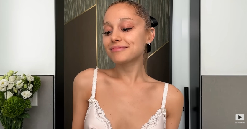 Ariana Grande getting ready to do her skincare routine from a post dated September 12, 2023. | Source: YouTube\Vogue