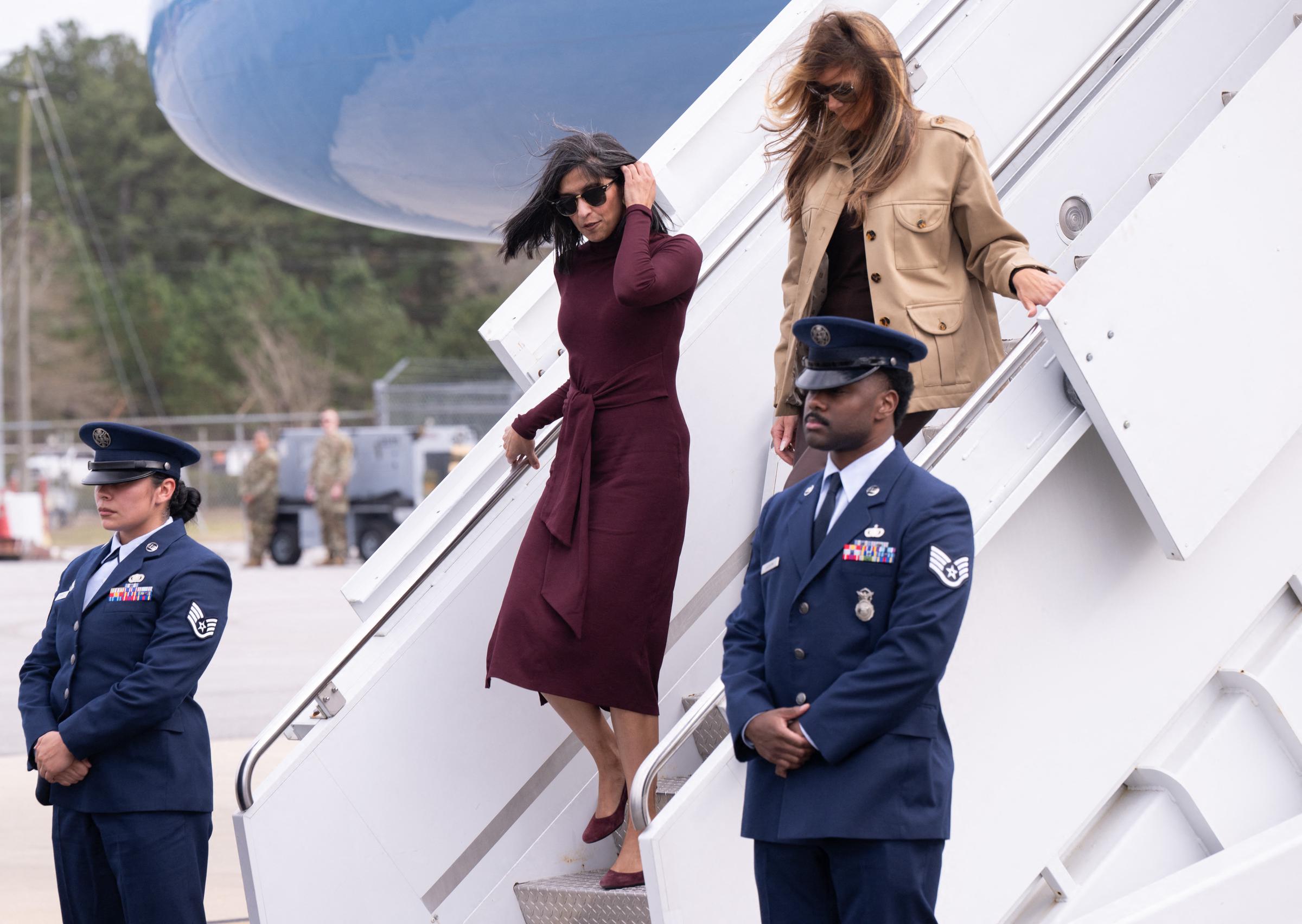 Usha Vance and Melania Trump disembark from their aircraft upon arrival at Albert J. Ellis Airport in Jacksonville, North Carolina, on November 19, 2025 | Source: Getty Images