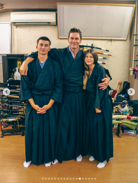 Benjamin, Tom, and Vivian Brady posing for a photo in samurai-inspired robes. | Source: Instagram/tombrady