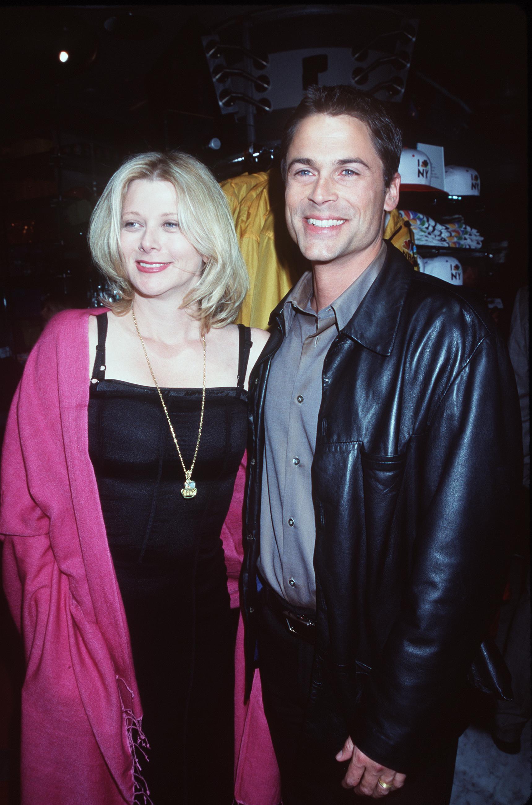 Rob and Sheryl Lowe are seen at the opening of NBC's store NBC Experience on May 13, 1999, in New York City. | Source: Getty Images
