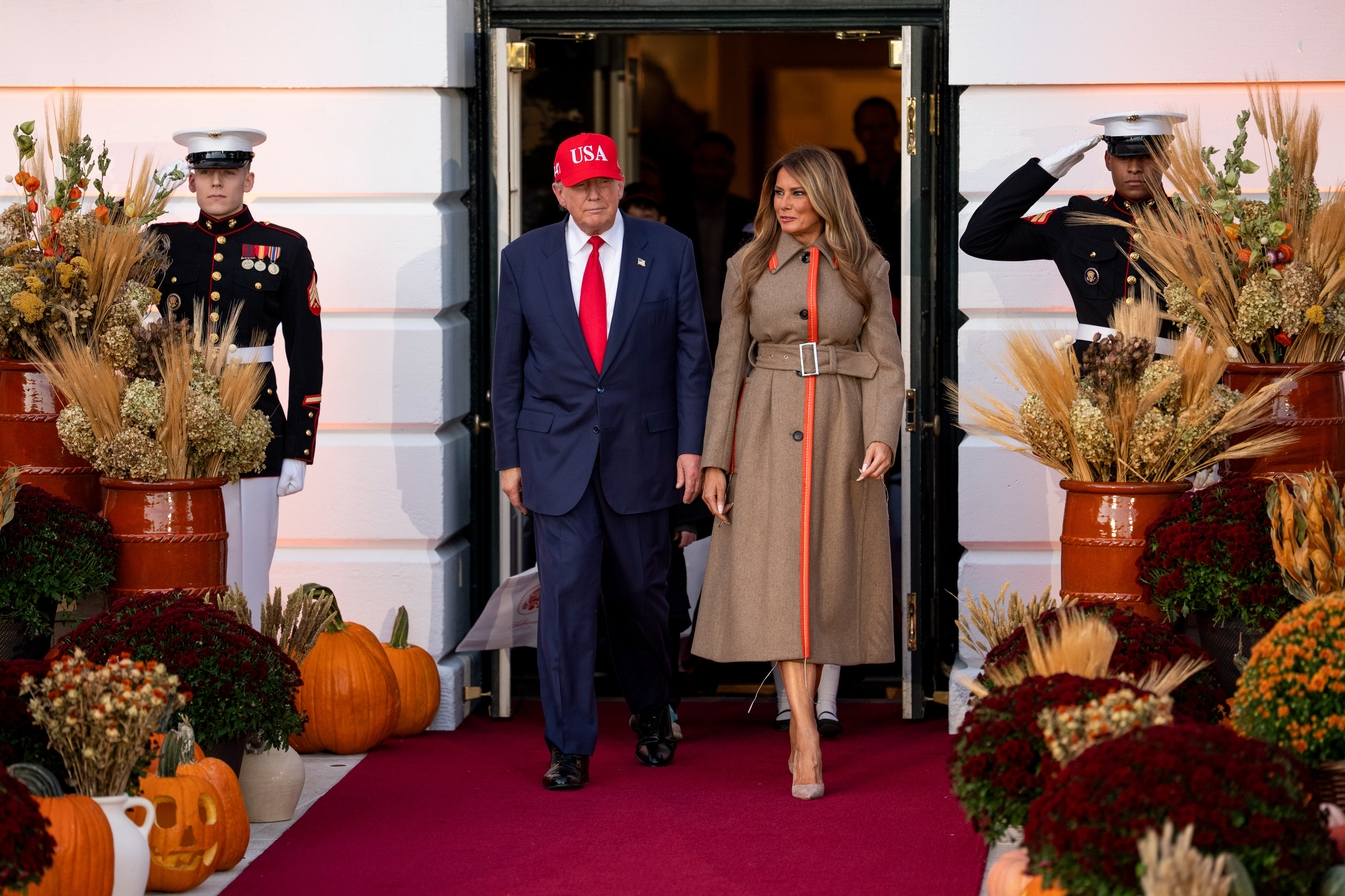 US President Donald Trump and First Lady Melania Trump arrive for a Halloween event on the South Lawn of the White House on October 30, 2025, in Washington, D.C. | Source: Getty Images