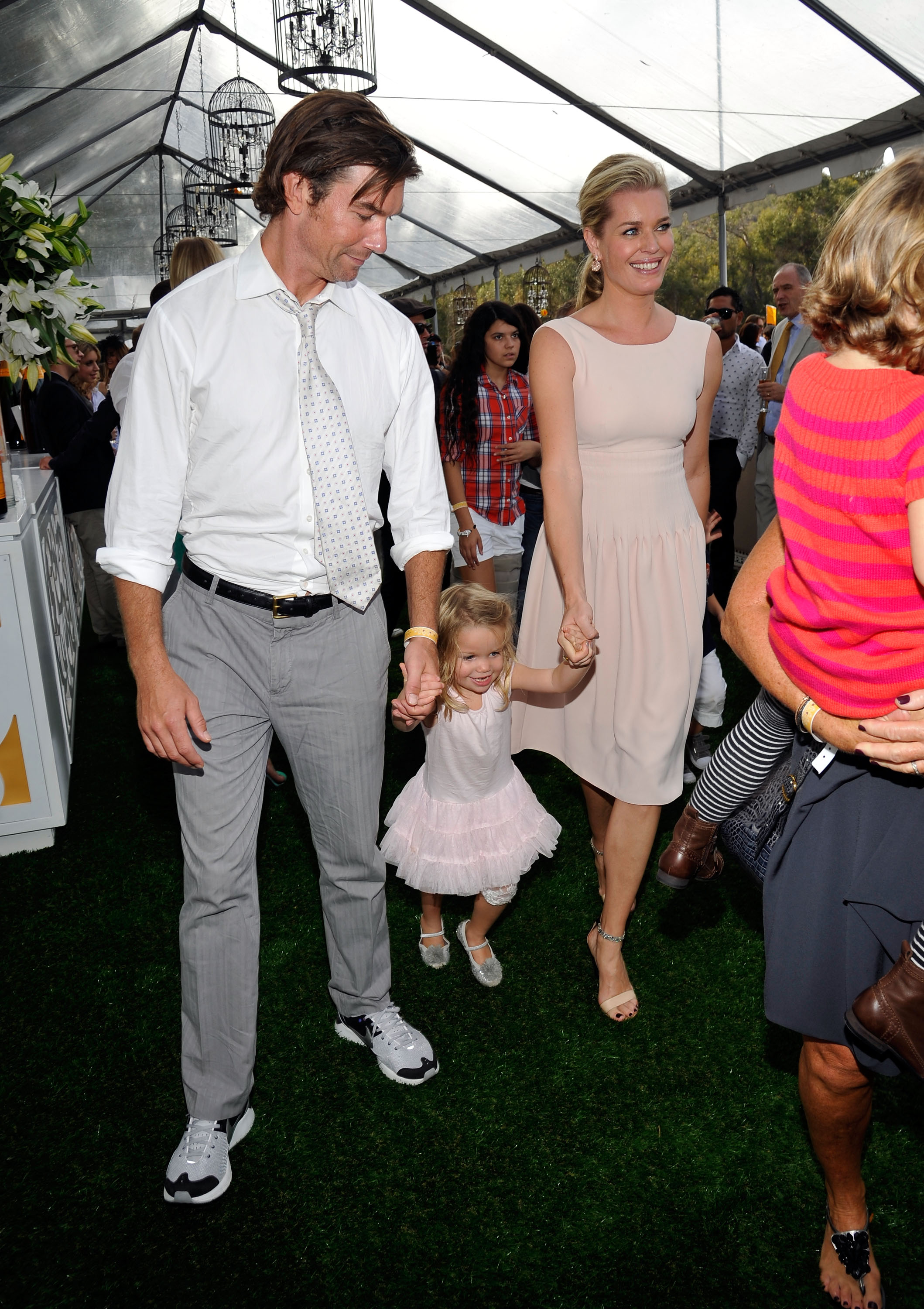 Jerry O'Connell and Rebecca Romijn with their daughter attend the Third Annual Veuve Clicquot Polo Classic at Will Rogers State Historic Park in Pacific Palisades, California on October 6, 2012 | Source: Getty Images