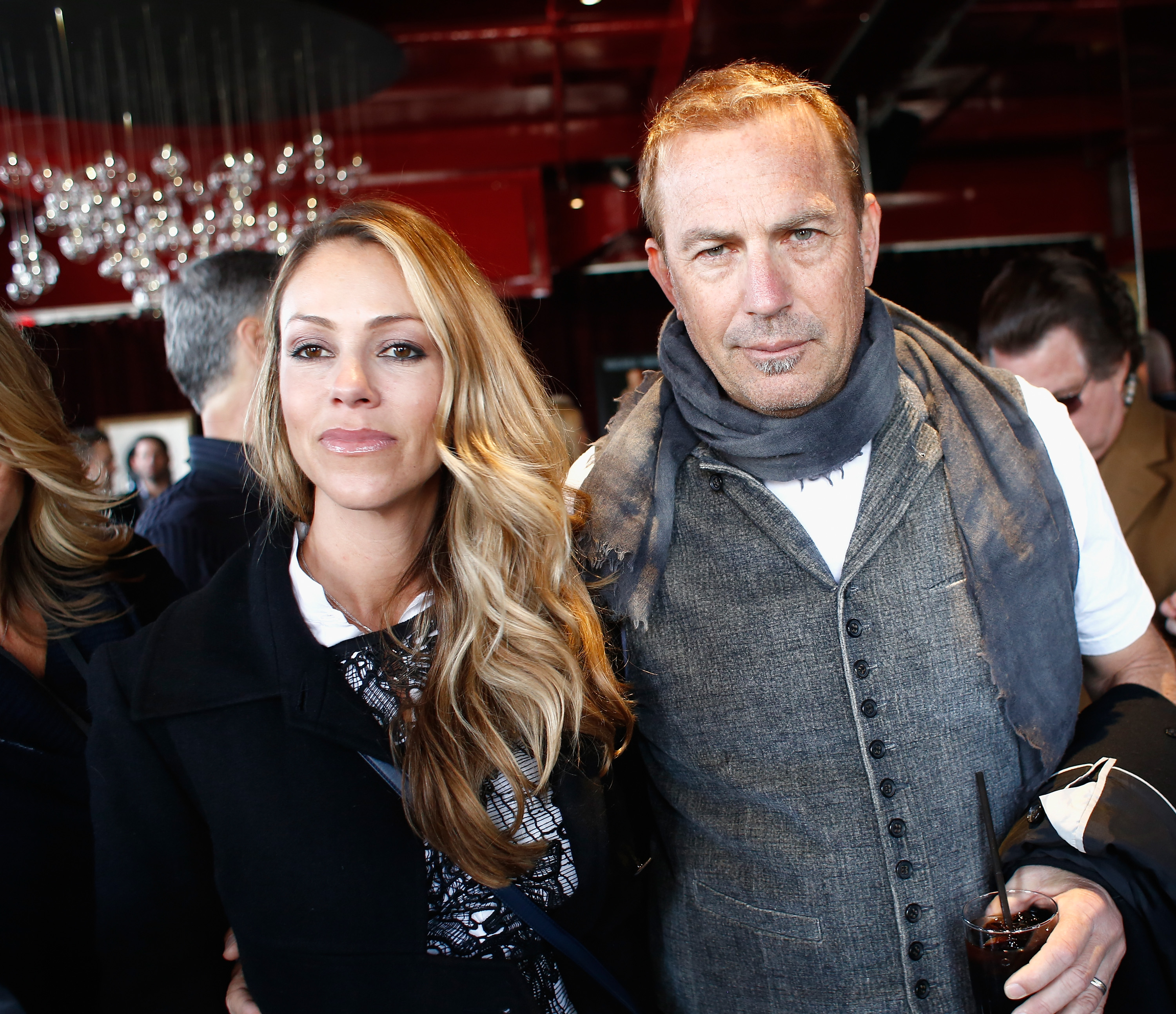 Christine Baumgartner and Kevin Costner attend the Leigh Steinberg Super Bowl Party on February 1, 2014 | Source: Getty Images