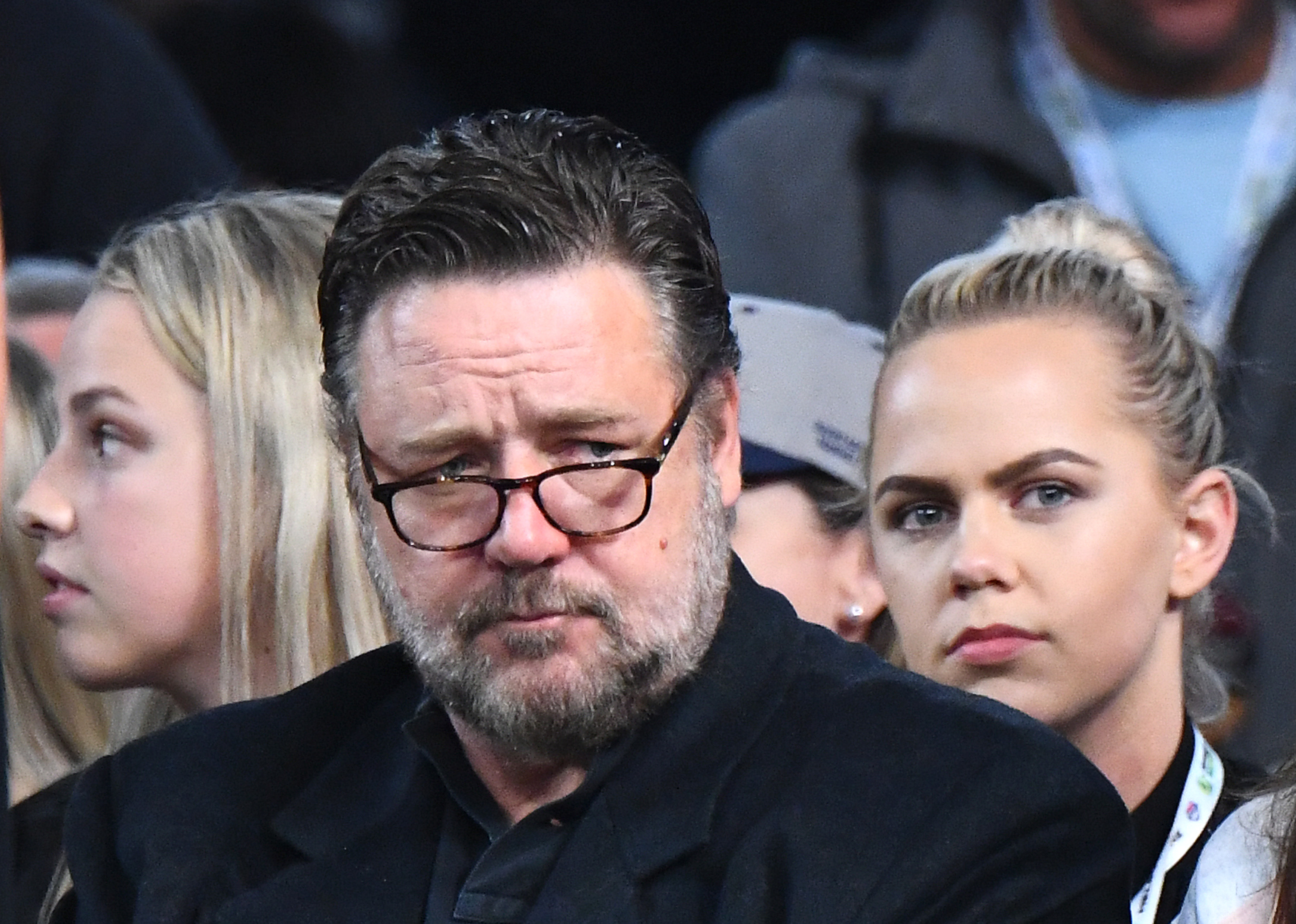 Russell Crowe attended the International Basketball Friendly match between the Australian Boomers and Team USA on August 22, 2019, in Melbourne, Australia. Wearing reading glasses and a dark blazer, the Hollywood star appeared noticeably heavier, his fuller face and graying beard reflecting a period when his weight remained a topic of public conversation ahead of his eventual health transformation.