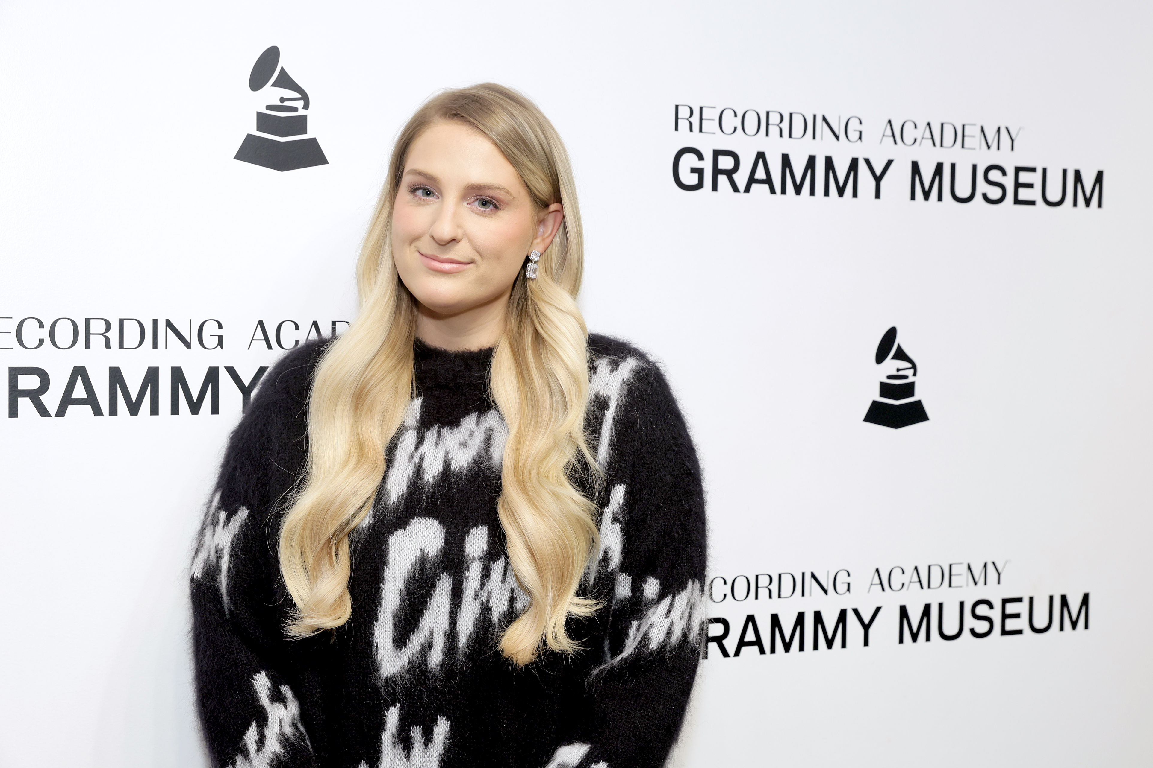 Meghan Trainor, 29, presented a visibly slimmer, more structured face, featuring sharper cheekbone definition, a tapered jawline, and a composed, gentle smile with slightly upturned lips, while attending "Spotlight: Meghan Trainor" at The GRAMMY Museum on November 8, 2023, in Los Angeles, California.