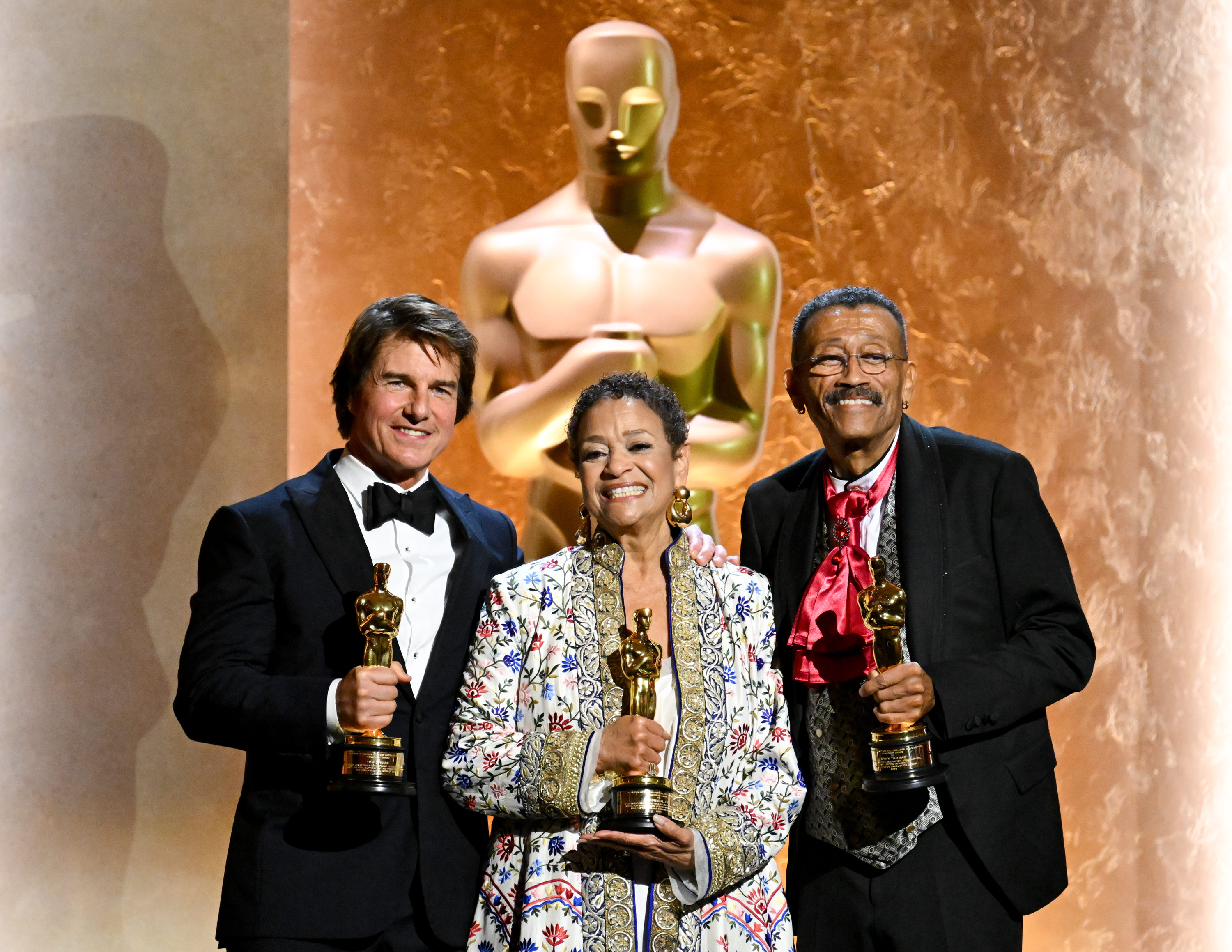 Tom Cruise, Debbie Allen, and Wynn Thomas at the 16th Governors Awards on November 16, 2025, in Los Angeles, California | Source: Getty Images