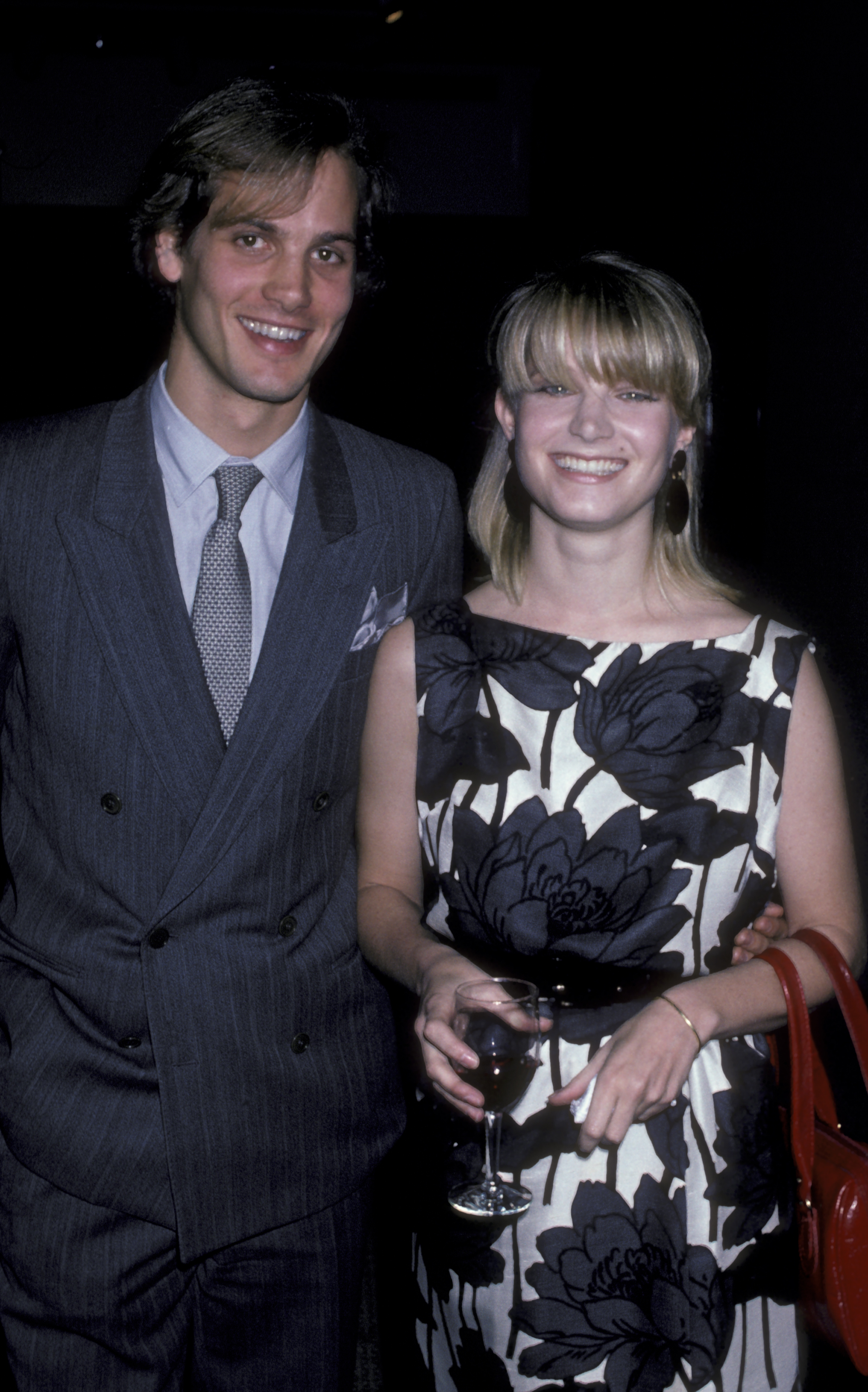 Alex Chert and Bridget Fonda seen at Sotheby's in New York City on April 22, 1986 | Source: Getty Images